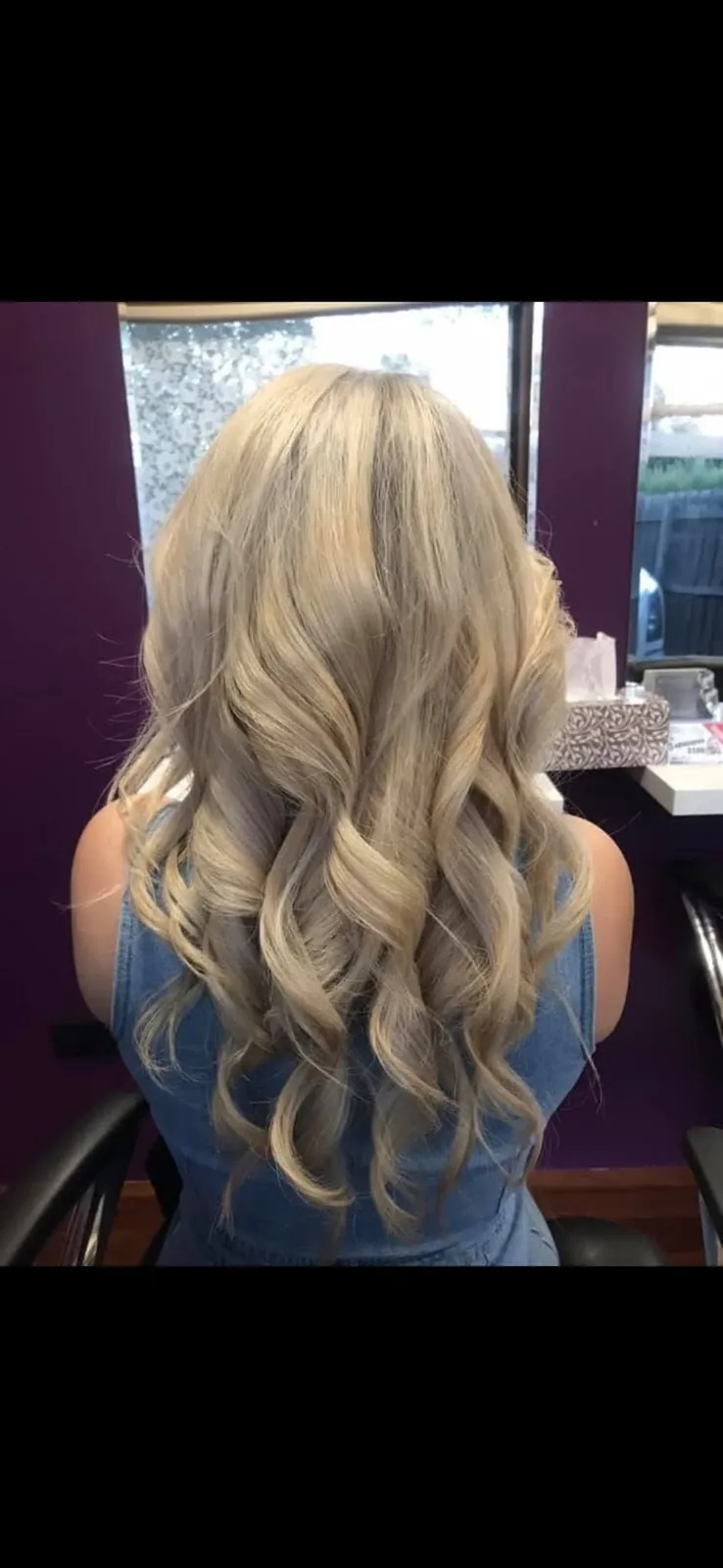 Blonde curled hairstyle